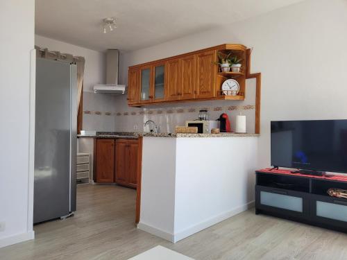 Kuchyň nebo kuchyňský kout v ubytování Casa Punta del Sol Atico Vista Al Mar