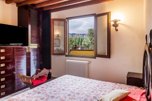 Ένα ή περισσότερα κρεβάτια σε δωμάτιο στο Villa Paradiso