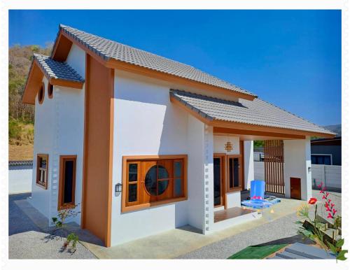 a realistic rendering of a small house at Taka Onzen in Ban Khao Ket