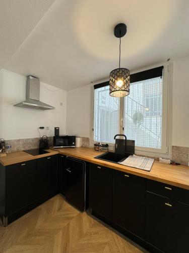 Η κουζίνα ή μικρή κουζίνα στο Petit appt cosy et moderne