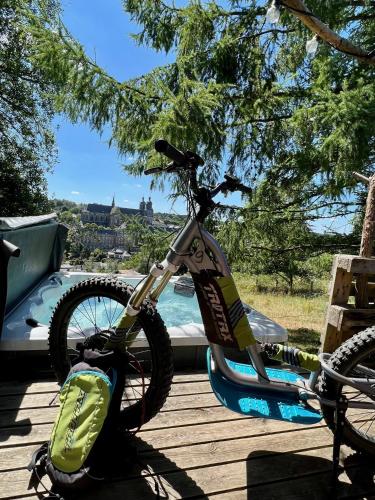 a dirt bike parked on a wooden deck at La St Hubsphair in Saint-Hubert