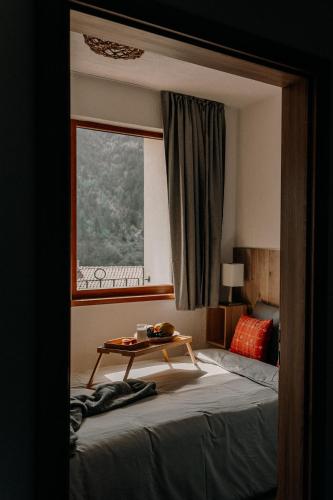Ένα ή περισσότερα κρεβάτια σε δωμάτιο στο Magnificent apartment in the mountains