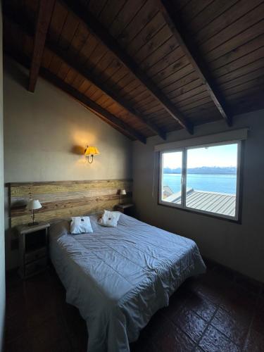 Postel nebo postele na pokoji v ubytování Bariloche Hostel