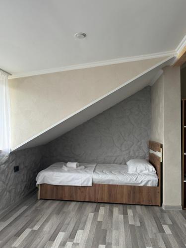 Una cama o camas en una habitación de Hagvi Resort