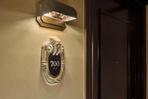 a wall plaque with a lion on a wall at Arctic Club Hotel in Seattle