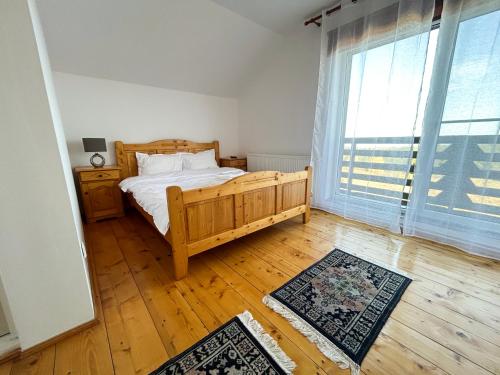 Ένα ή περισσότερα κρεβάτια σε δωμάτιο στο B&C Mountain Retreat