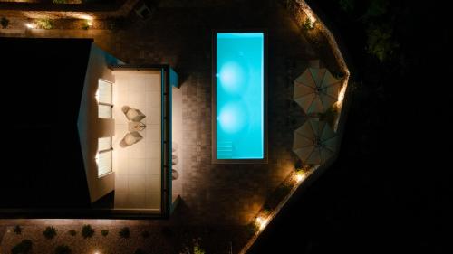an overhead view of a shower with a blue light at Villa Delight in Kras