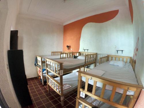 Postel nebo postele na pokoji v ubytování Ricks hostel Santa Ana