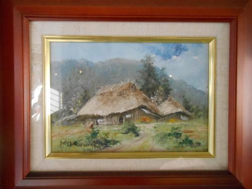 a painting of a house with a thatch roof at kinugawaonsen Fukumatsu in Nikko