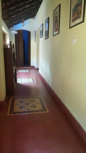 Ένα ή περισσότερα κρεβάτια σε δωμάτιο στο Casa Menezes - A Heritage Goan Homestay