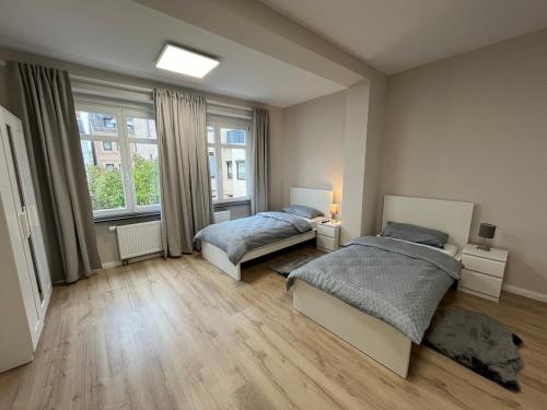 Ένα ή περισσότερα κρεβάτια σε δωμάτιο στο Luxus City Villa