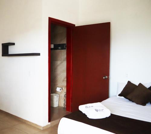 Postel nebo postele na pokoji v ubytování Hotel Larú spa resort