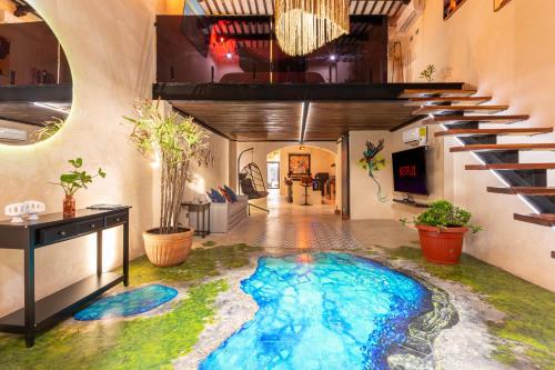 a room with a swimming pool in the floor at Casa Avitia 2BR/2BA in Mérida
