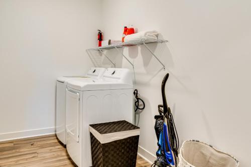 a washing machine in a laundry room with a shelf at 4 Mi to Dtwn Danville Home with Patio and Yard in Danville