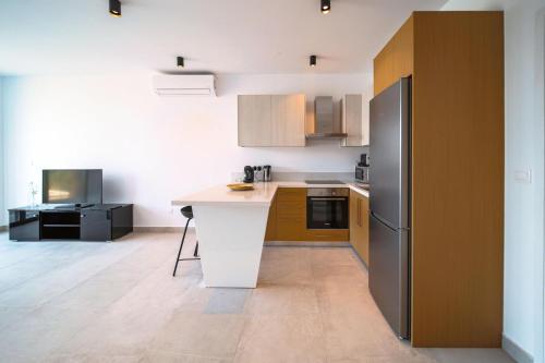 Cuina o zona de cuina de Avenue 102 1 BED