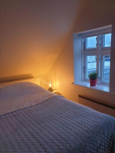 Guesthouse Lyngholtにあるベッド