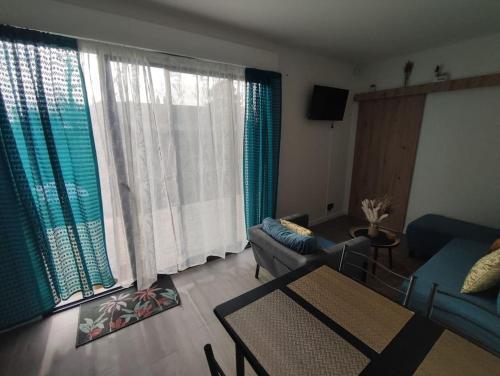 Χώρος καθιστικού στο Logement proche Caen et plages