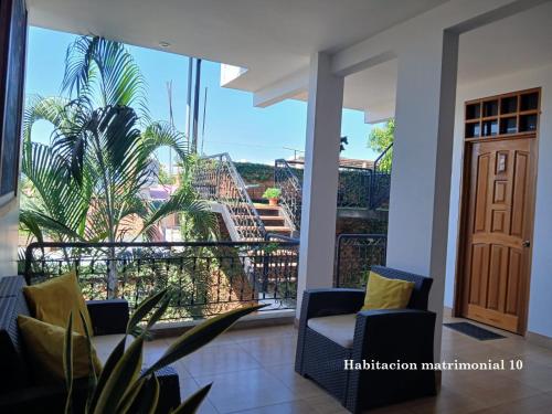 a room with a balcony with a view of a staircase at Alojamiento Familiar Custodia in Tarapoto