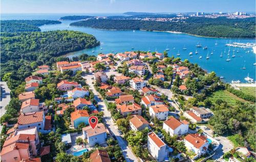 an aerial view of a town next to a body of water at 1 Bedroom Amazing Apartment In Banjole in Banjole