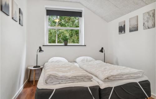 Ένα ή περισσότερα κρεβάτια σε δωμάτιο στο Five-Bedroom Holiday Home In Grenaa