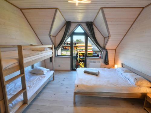 Postel nebo postele na pokoji v ubytování Holiday home with terrace, sauna