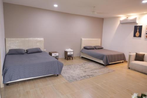 Ένα ή περισσότερα κρεβάτια σε δωμάτιο στο La Maye casa finca