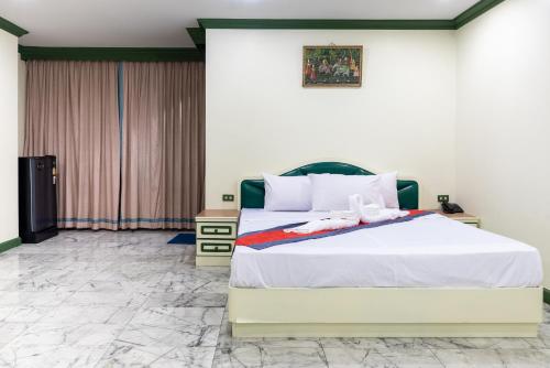 Postel nebo postele na pokoji v ubytování 75 Paradise Lane Managed by Loft Group