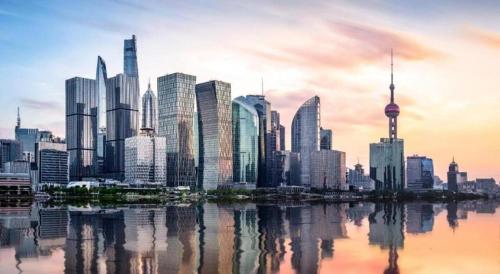 a view of a large city with a city skyline at Magnotel Shanghai Maglev Station in Shanghai