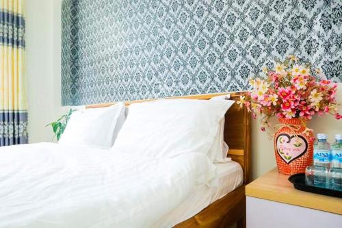 Postel nebo postele na pokoji v ubytování Memory Homestay Hue