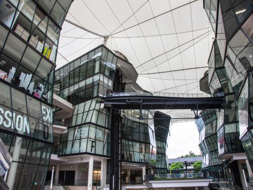 a view of a building with a glass ceiling at Village Hotel Albert Court by Far East Hospitality in Singapore