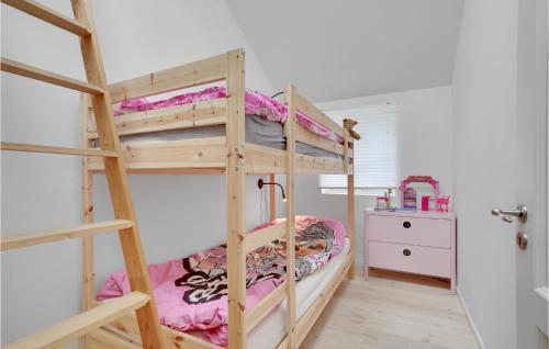 a bedroom with two bunk beds in a room at Lovely Home In Rødvig Stevns With Wifi in Rødvig