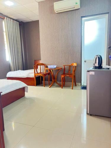 Kuchyň nebo kuchyňský kout v ubytování Gia Tú Hotel