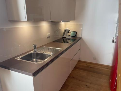 Kuchyň nebo kuchyňský kout v ubytování Davenna Loft