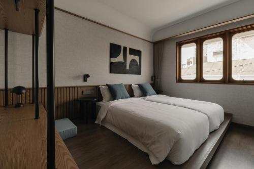 Postel nebo postele na pokoji v ubytování Maison Wilhelmina