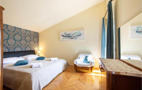 Katil atau katil-katil dalam bilik di Three-Bedroom Apartment In Ostrvica