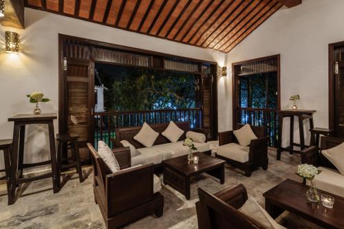 Posezení v ubytování Legacy Hoi An Resort