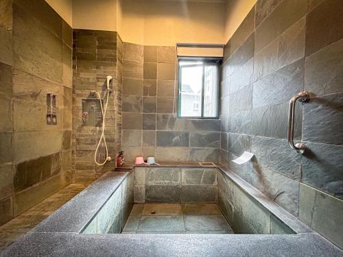 Et badeværelse på 森泉湯宿