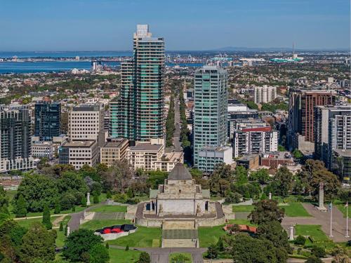 an aerial view of a city with tall buildings at Seasons Botanic Gardens in Melbourne