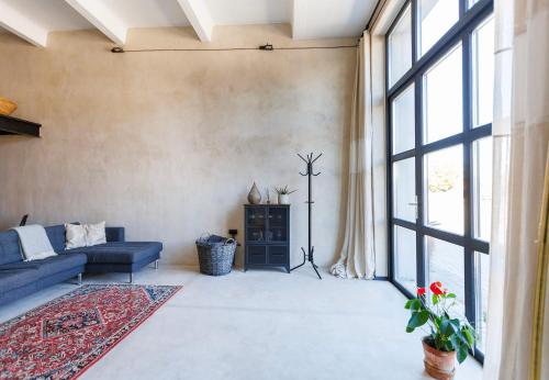 En eller flere senge i et værelse på Maruse's Apartment