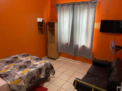 Μια τηλεόραση ή/και κέντρο ψυχαγωγίας στο Good Time Guest House