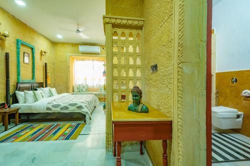Un ou plusieurs lits dans un hébergement de l'établissement Bhim Kothi