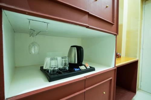 Cuisine ou kitchenette dans l'établissement Bhim Kothi