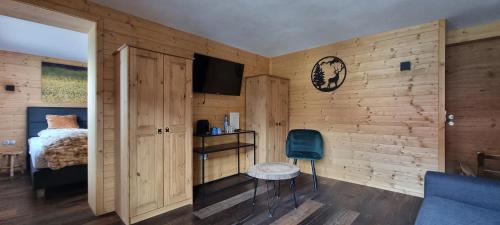 Alpen Lodge Berwangにあるテレビまたはエンターテインメントセンター
