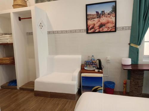 Postel nebo postele na pokoji v ubytování Mi Nhon Em Hotel Muine