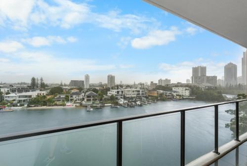 a view of a river from a balcony at The Riviera - Brand New Luxury River Front 2 Bedroom Unit with Parking & Pool in Gold Coast