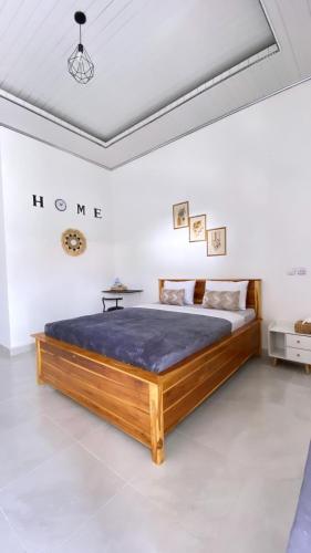 Ένα ή περισσότερα κρεβάτια σε δωμάτιο στο Juliana HomeStay