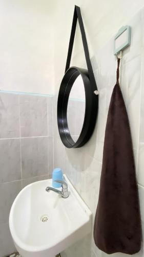 Ένα μπάνιο στο Juliana HomeStay