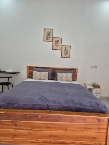 Ένα ή περισσότερα κρεβάτια σε δωμάτιο στο Juliana HomeStay