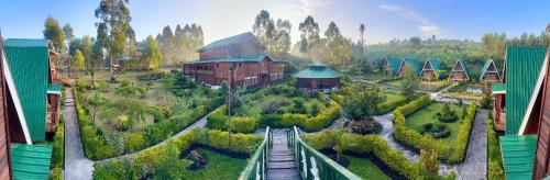 an aerial view of a miniature garden with a train at Nsaho resort in Fort Portal