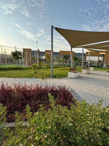a pavilion with a canopy in a park at Small details1 Self-check-in in Riyadh